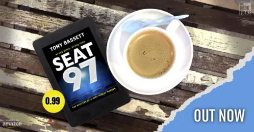 Image of table with cup of tea and the book Seat 97 by Tony Bassett